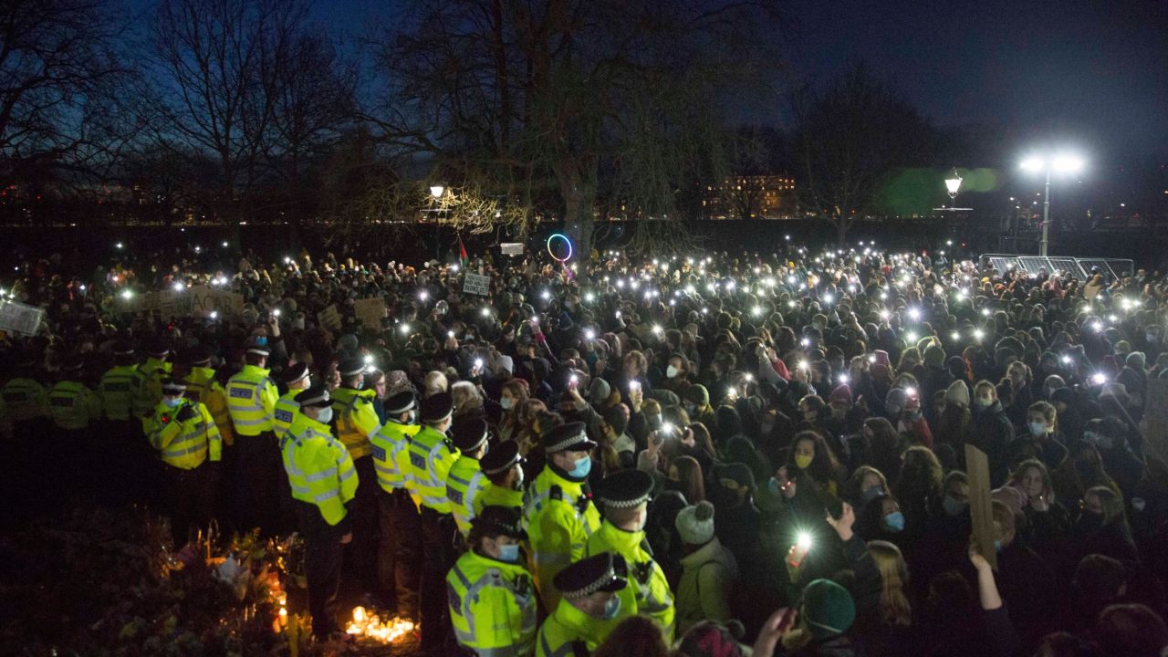 Crowds gather at a makeshift memorial to Everard in Clapham in south London, where she was last seen.