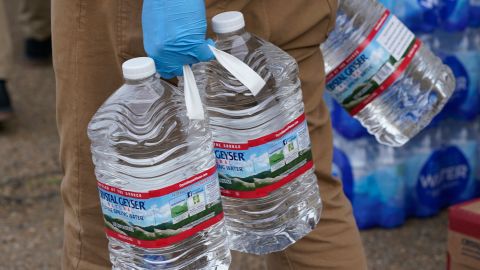 The faculty and students at Provine High School served prepared meals and distributed bottled water to residents in west Jackson, Mississippi, Thursday, March 11, 2021. 