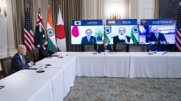 U.S. President Joe Biden, left, and Antony Blinken, U.S. secretary of state, second left, attend a virtual Quadrilateral Security Dialogue (Quad) meeting with leaders of Japan, Australia and India in the State Dining Room of the White House in Washington, D.C, U.S., on Friday, March 12, 2021. Biden and the other leaders of the Quad countries are meeting for the first time meant to project a common front in the face of China's tussles on the Himalayan border with India, crackdown in Hong Kong and trade reprisals against Australia. Photographer: Jim Lo Scalzo/EPA/Bloomberg via Getty Images