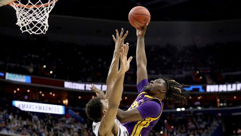 Naz Reid of the LSU Tigers shoots the ball against Kenny Goins  of the Michigan State Spartans during the second half in the East Regional game of the 2019 NCAA Men's Basketball Tournament at Capital One Arena on March 29, 2019, in Washington, DC.