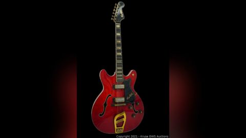 The flaming red Hagstrom Viking II guitar is up for auction.