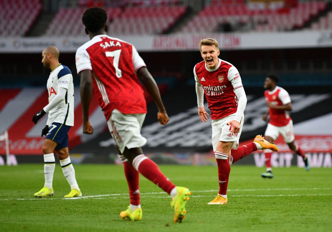 Ødegaard (right) celebrates after scoring the equalizing goal against Tottenham.