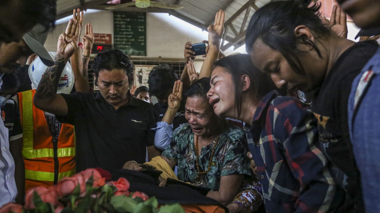 Relatives and friends react during the funeral procession of Ko Saw Pyae Naing, 21, who died in the anti-coup protests, in Mandalay, Myanmar, on March 14. 