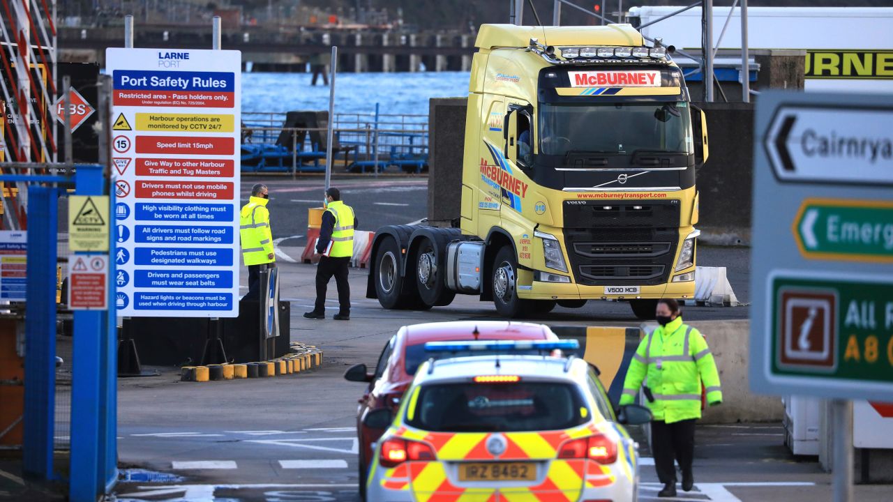 Customs officials check vehicles at the P&O ferry terminal at the Port of Larne in Northern Ireland on January 1, 2021. 
