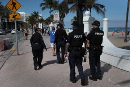 Fort Lauderdale police patrol the beach.