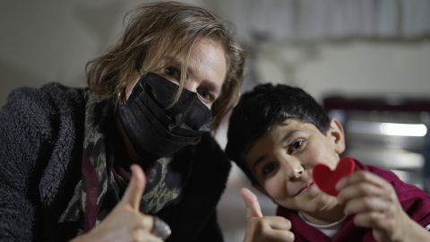 CNN's Arwa Damon with 10-year-old Sultan who suffered from burns after an attack near him in Idlib.