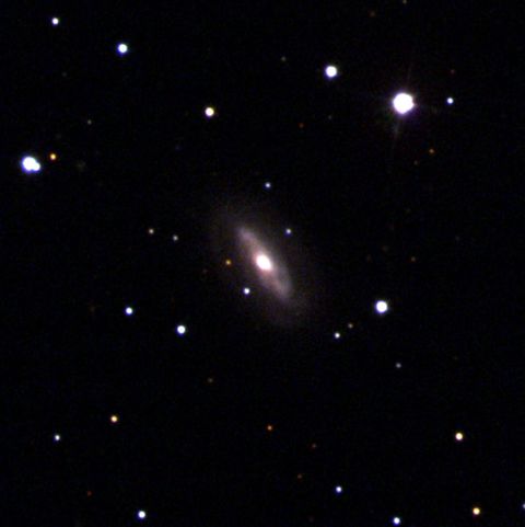 This image from the Sloan Digital Sky Survey shows the galaxy J0437+2456, which includes a supermassive black hole at its center that appears to be moving. 