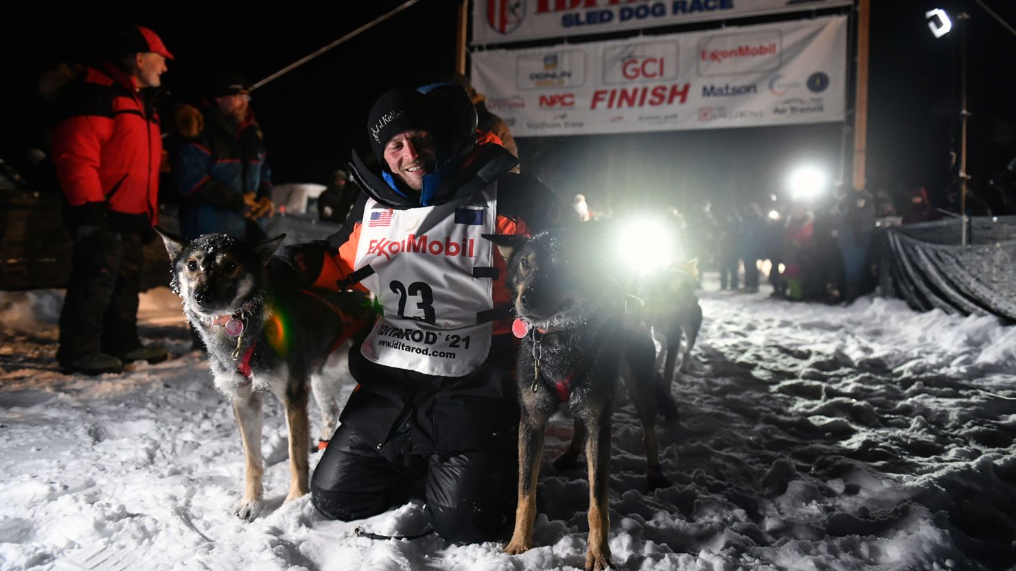 Dallas Seavey poses with his dogs after crossing the finish line to win the Iditarod Trail Sled Dog Race race near Willow, Alaska, early Monday, March 15, 2021. 