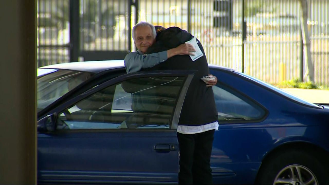 Jose Villarruel hugs his former student, Steven Nava, after getting a huge birthday surprise in Fontana, California.