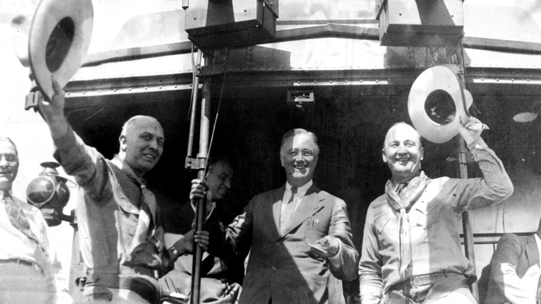 Two cowboys join Franklin D. Roosevelt during an electioneering tour in 1932.