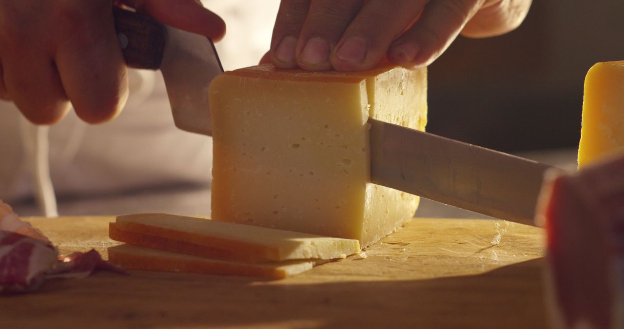 A post-dinner snack of cheese can also help you get a better night's rest. Yes, please.