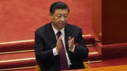 Chinese President Xi Jinping applauds during the closing session of the National People's Congress in Beijing on Thursday, March 11, 2021. China's ceremonial legislature on Thursday endorsed the ruling Communist Party's latest move to tighten control over Hong Kong by reducing the role of its public in picking the territory's leaders. (AP Photo/Sam McNeil)