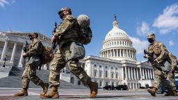 National Guard walk on the Capitol grounds on Thursday, March 4, 2021 in Washington, DC.