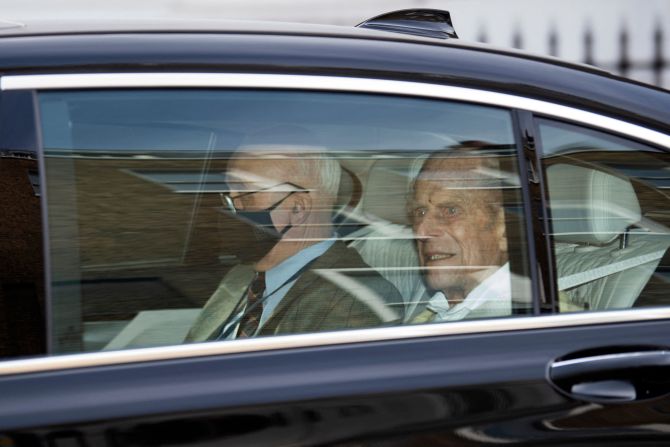 Prince Philip, right, leaves a London hospital in March 2021. <a href="index.php?page=&url=https%3A%2F%2Fwww.cnn.com%2F2021%2F03%2F16%2Fuk%2Fprince-philip-leaves-hospital-scli-intl-gbr%2Findex.html" target="_blank">He had a heart procedure</a> a couple of weeks earlier.