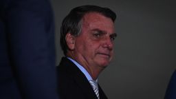 Jair Bolsonaro, Brazil's president, arrives for a ceremony at the Planalto Palace in Brasilia, Brazil, on Wednesday, Feb. 24, 2021. Economy Minister Paulo Guedes joined the Bolsonaro administration in 2019 as a super minister charged with steering Latin America's largest economy, but two years later, it's the president who's increasingly calling the shots and moving away from his star ministers market-friendly agenda. Photographer: Andres Borges/Bloomberg via Getty Images