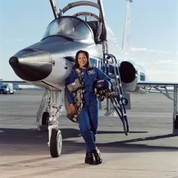 Retired astronaut Joan Higginbotham in front of a NASA T-38 trainer in 2003.