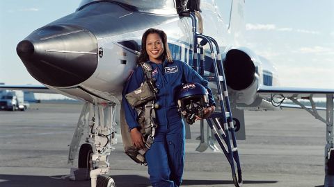 Retired astronaut Joan Higginbotham in front of a NASA T-38 trainer in 2003.