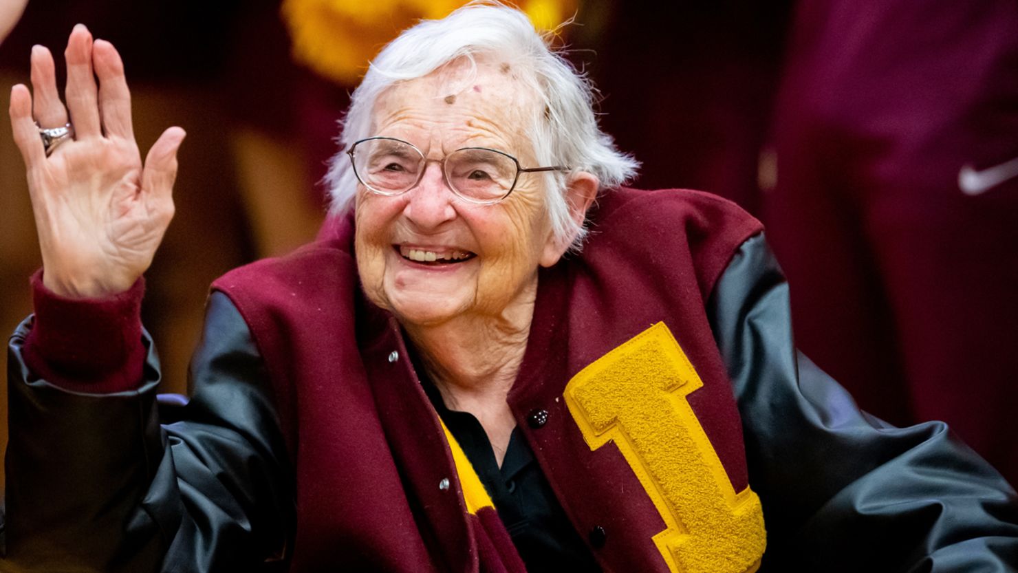 Sister Jean Dolores Schmidt, the chaplain for the Loyola University Chicago Ramblers, celebrates a victory in January 2019.