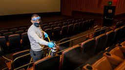Atta Areqat, general manager at the Cinemark Playa Vista and XD movie theater in the Playa Vista neighborhood, of Los Angeles, CA, demonstrates how they will clean their theater every morning prior to opening, Monday, March 15, 2021, as covid-19 restrictions are loosened. 