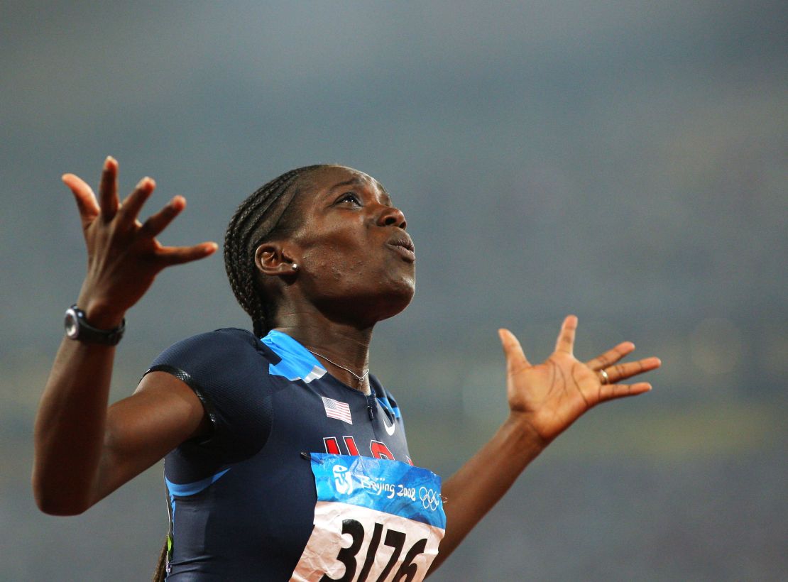 Harper-Nelson celebrates winning gold at the 2008 Olympics.