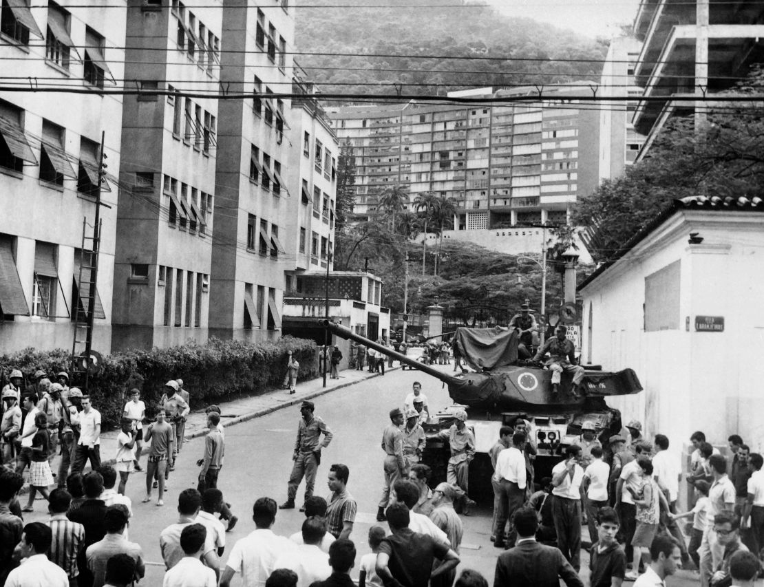 Brazilian army tanks in front of Laranjeiras Palace in Rio de Janeiro, 1964, as the Brazilian Armed Forces took control of the country. 