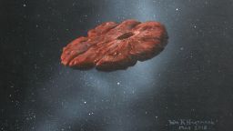 Artist's concept of the 'Oumuamua interstellar object as a pancake-shaped disk.