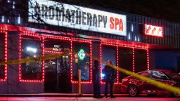 TOPSHOT - Law enforcement personnel are seen outside a massage parlor where a person was shot and killed on March 16, 2021, in Atlanta, Georgia. - Eight people were killed in shootings at three different spas in the US state of Georgia on March 16 and a 21-year-old male suspect was in custody, police and local media reported, though it was unclear if the attacks were related. (Photo by Elijah Nouvelage / AFP) (Photo by ELIJAH NOUVELAGE/AFP via Getty Images)
