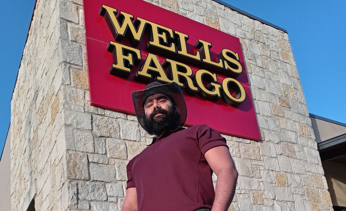 Wells Fargo employee Ted Laurel, 38, stands outside a Wells Fargo location in the San Antonio metro area in March 2021.