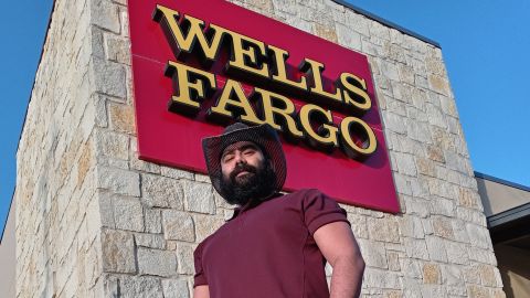 Wells Fargo employee Ted Laurel, 38, stands outside a Wells Fargo location in the San Antonio metro area in March 2021.
