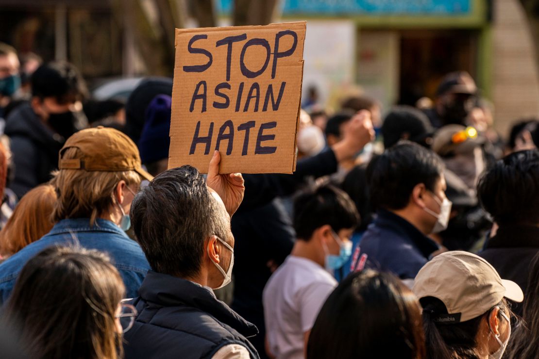 Demonstrators gather in the Chinatown-International District for a "We Are Not Silent" rally and march against anti-Asian hate and bias on March 13 in Seattle. 