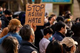 Demonstrators gather in the Chinatown-International District for a "We Are Not Silent" rally and march against anti-Asian hate and bias on March 13 in Seattle. 