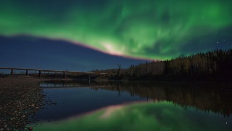 The aurora borealis, captured by Dene photographer and conservationist Ryan Dickie, shines bright over the Fort Nelson River in far northeast British Columbia, Canada. 