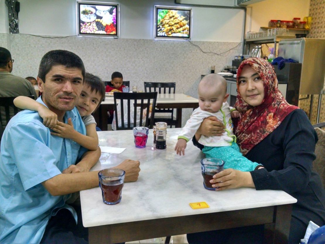 A family photo of Mamutjan, his daughter Muhlise, his wife Muherrem and their young baby boy in Malaysia in 2015.
