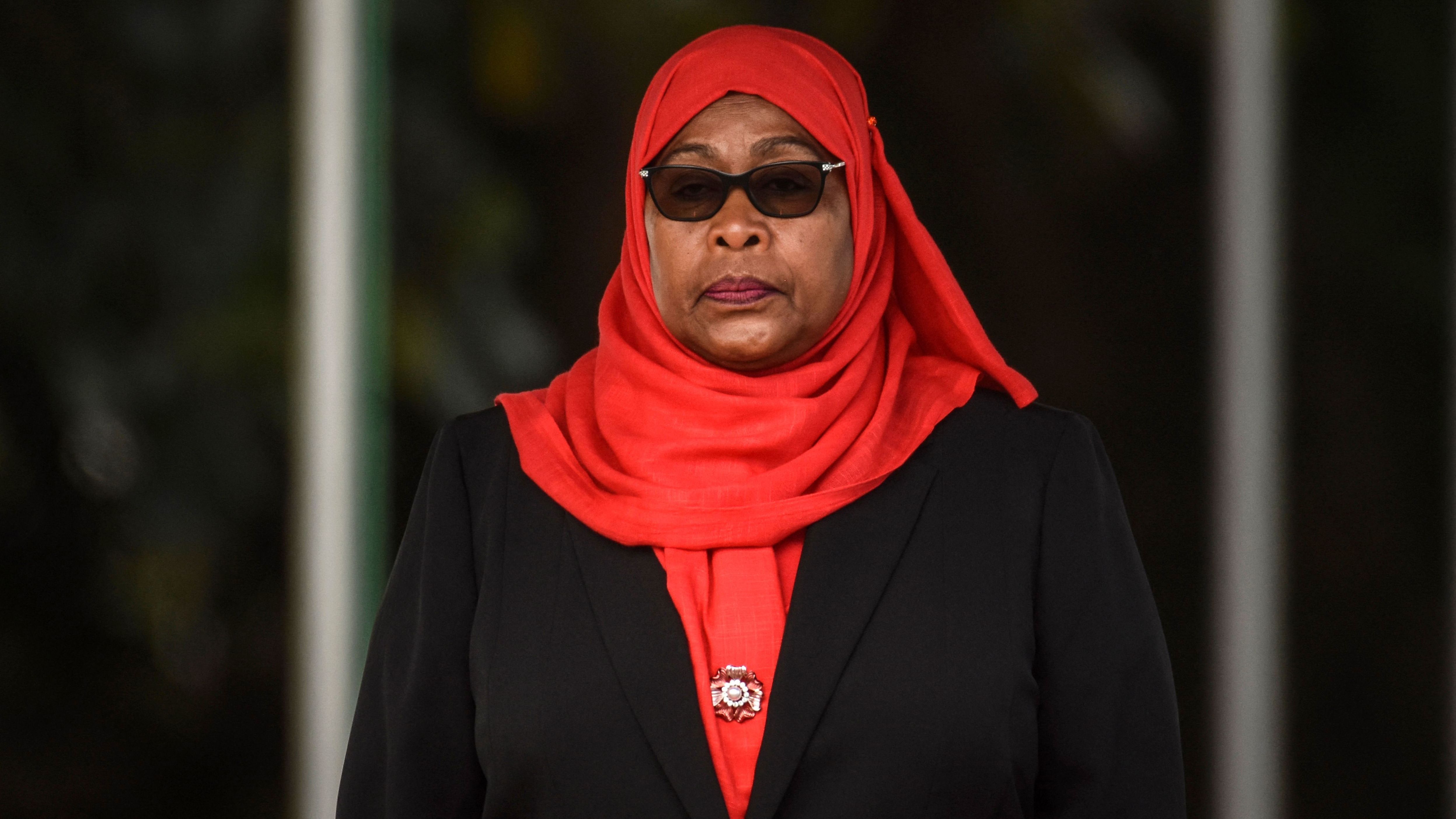 Tanzanian President Samia Suluhu Hassan inspects a military parade following her swearing in as the country's first female president Friday in Dar es Salaam, Tanzania.