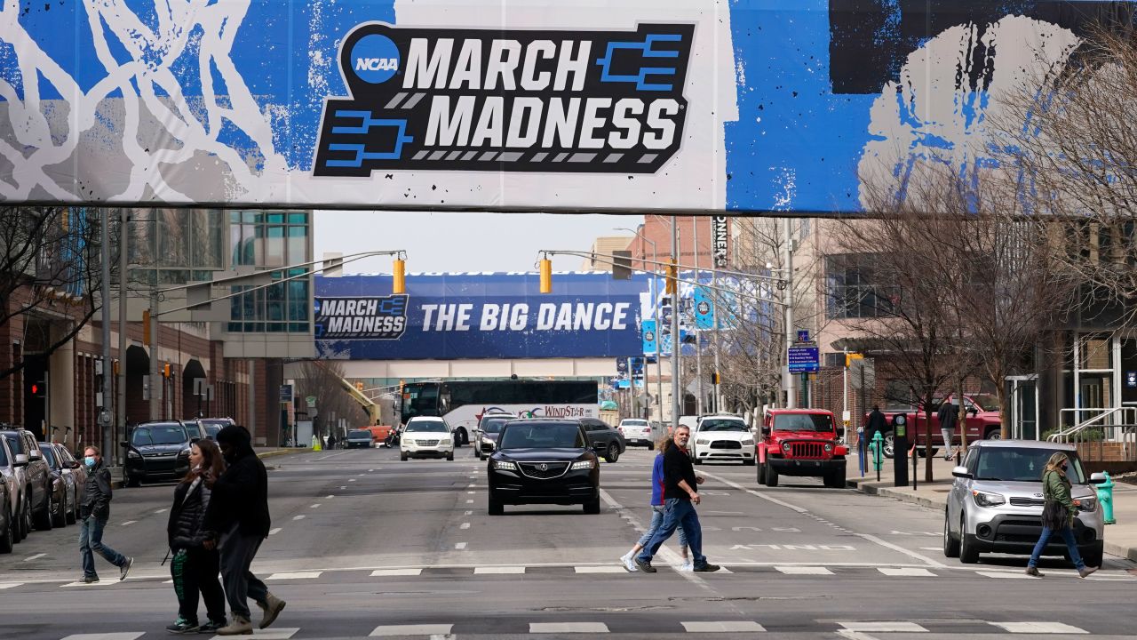 March Madness banners for the NCAA college basketball tournament are seen in downtown Indianapolis on March 17, 2021.