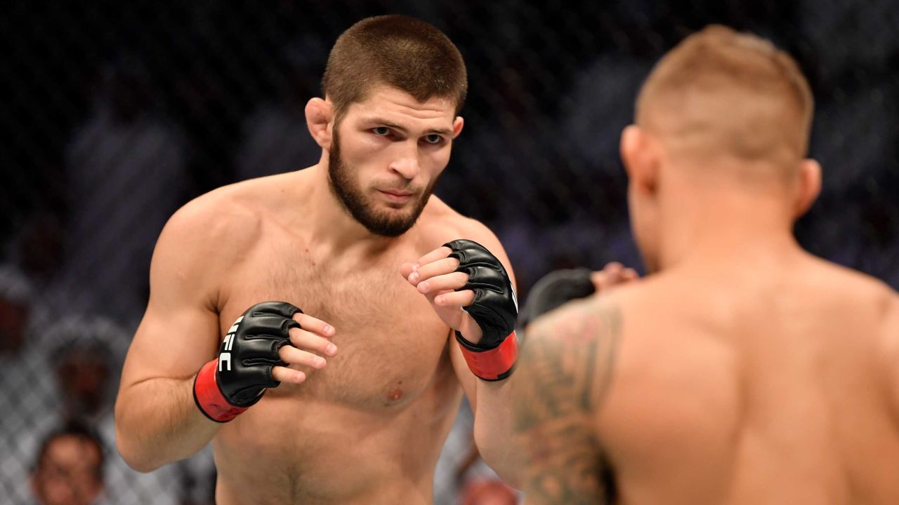 Nurmagomedov battles Dustin Poirier in their lightweight championship bout during UFC 242.