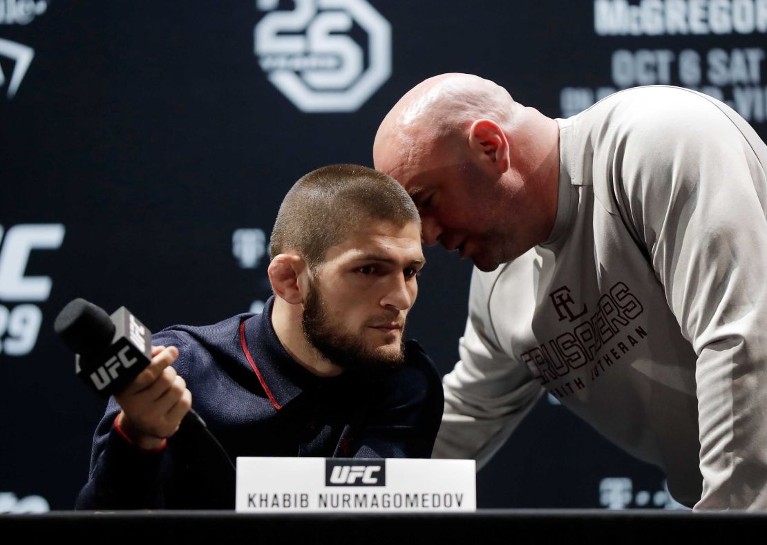 White (right) speaks with Nurmagomedov during a press conference for UFC 229.