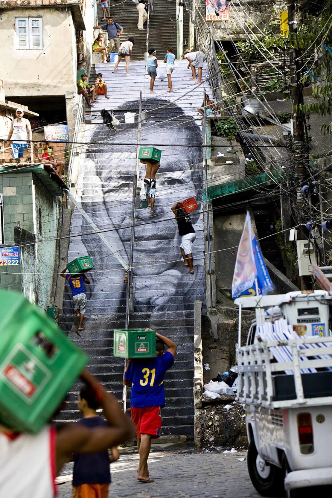 "28 Millimètres" is part of JR's  Women Are Heroes series in Rio de Janeiro, 2008