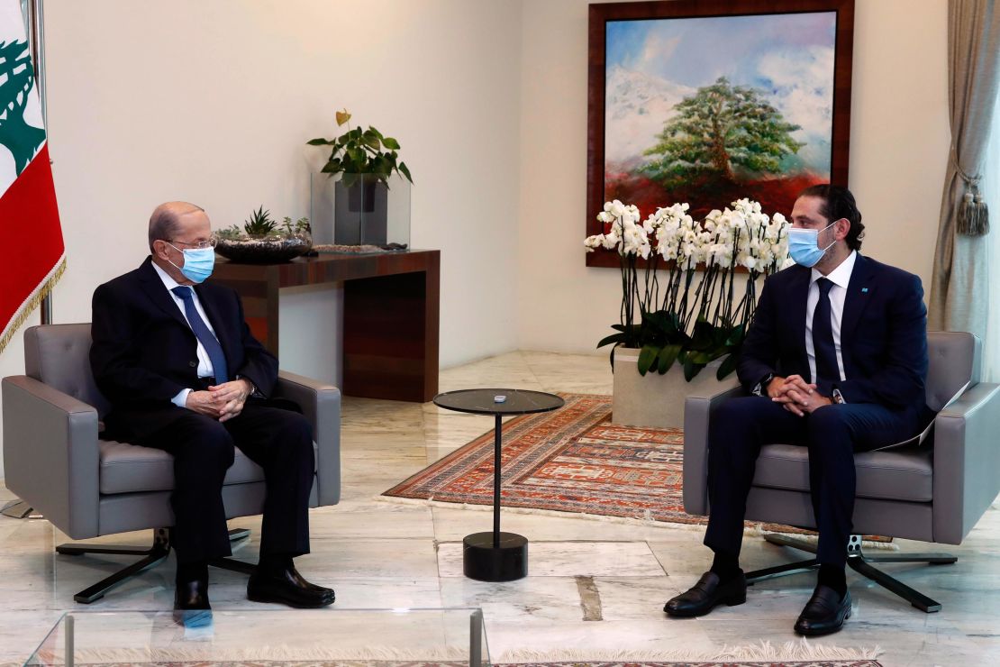 President Michel Aoun (L) meets with Prime Minister-Designate Saad Hariri at the presidential palace on March 18. 