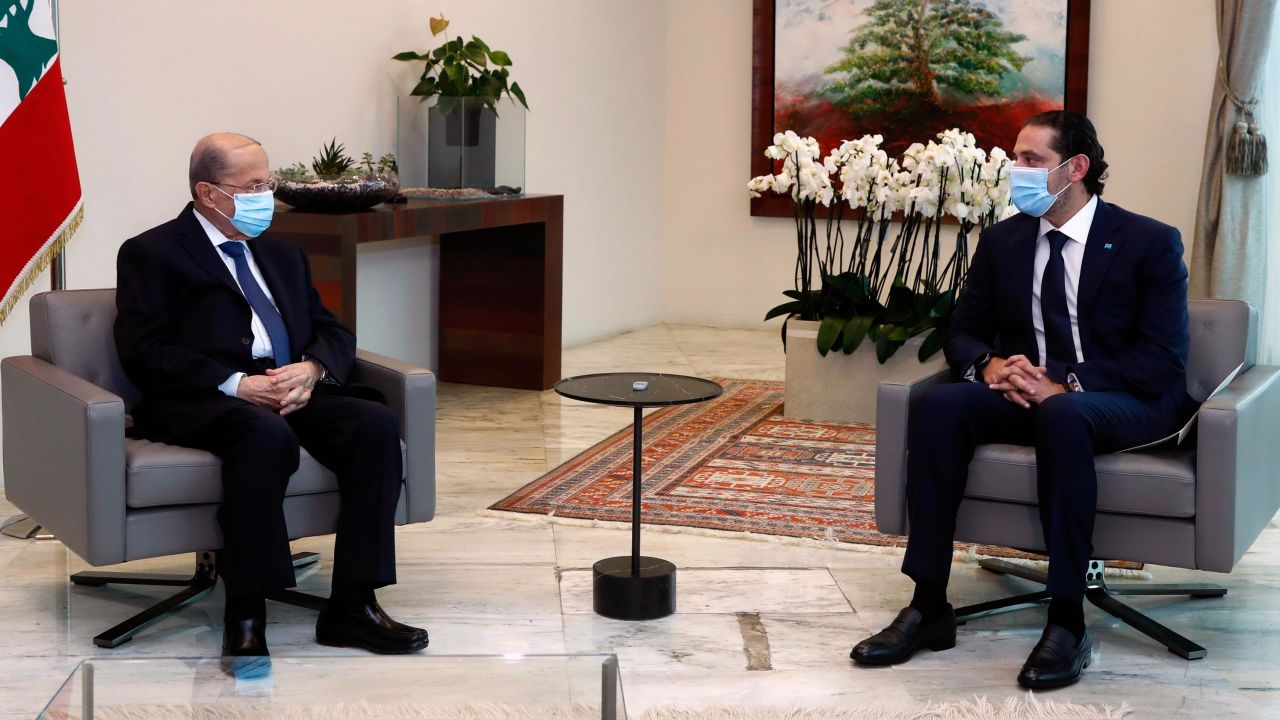 President Michel Aoun (L) meets with Prime Minister-Designate Saad Hariri at the presidential palace on March 18.