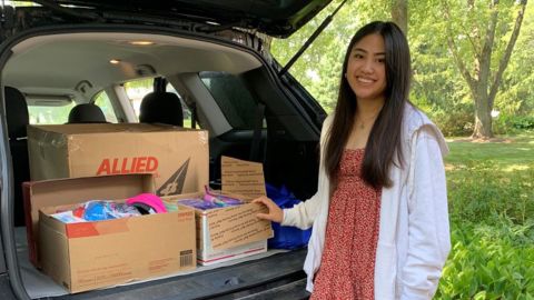 Jenica Baron, cofounder of Her Drive, loads up donations for Deborah's Place, a women's shelter in Chicago that was one of the recipients for their drive in July.