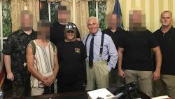Roger Stone poses with Connie Meggs and Graydon Young, two alleged members of the Oath Keepers militia, at a book-signing in Florida in December 2020. The other people in the photo have not been identified by CNN and their faces have been obscured to protect their privacy.