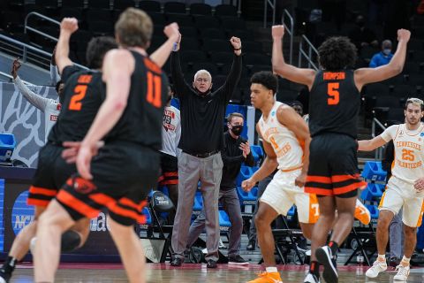 Oregon State head coach Wayne Tinkle celebrates a 3-pointer with his players during their upset win over Tennessee on March 19. The 12th-seeded Beavers defeated the fifth-seeded Volunteers 70-56.