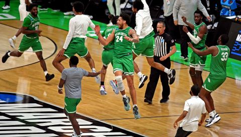 North Texas players celebrate after they upset Purdue on March 19. The Mean Green, a 13-seed, won 78-69 in overtime.