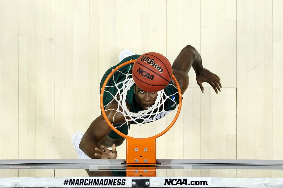 Ohio's Dwight Wilson III watches his layup fall through the net during the Virginia game.