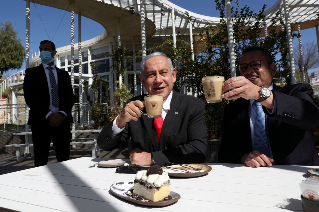 Netanyahu and Jerusalem Mayor Moshe Lion have a coffee and cake at a newly reopened restaurant in the city.
