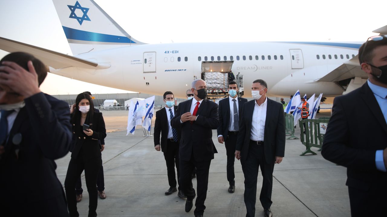 Netanyahu and Health Minister Yuli Edelstein welcome the arrival of a plane carrying a shipment of Pfizer-BioNTech coronavirus vaccine in January.