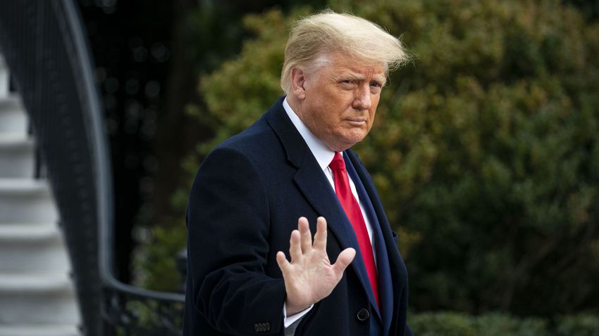  President Donald Trump waves as he departs on the South Lawn of the White House, on December 12, 2020 in Washington, DC.