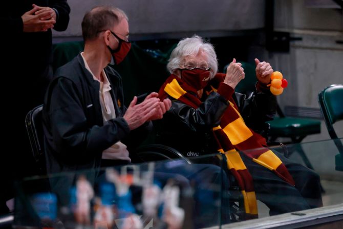 Sister Jean Dolores Schmidt, Loyola's 101-year-old chaplain, cheers on her team after their big win over Illinois. <a href="index.php?page=&url=https%3A%2F%2Fwww.cnn.com%2F2021%2F03%2F16%2Fus%2Floyola-sister-jean-march-madness-trnd%2Findex.html" target="_blank">The basketball-loving nun</a> became famous in 2018 during the school's Cinderella run to the Final Four.