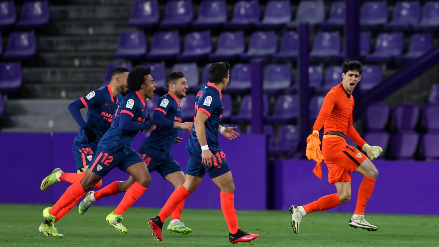 Yassine Bounou wheels away in celebration after scoring Sevilla's equalizer
